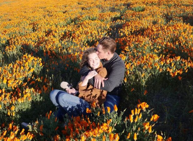 Billy is kissing meghann.